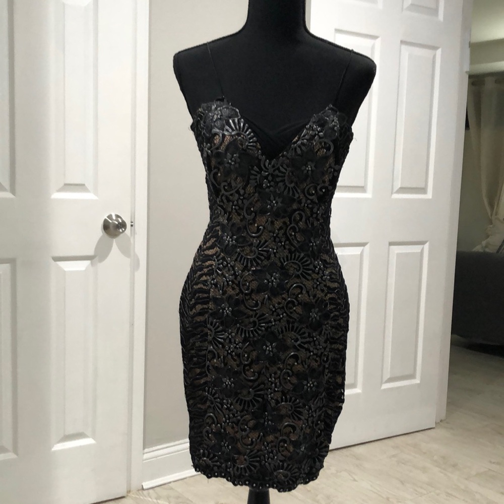 Boutique hand Painted mini dress w/ spaghetti strap. Size medium (4/6) COUTURE